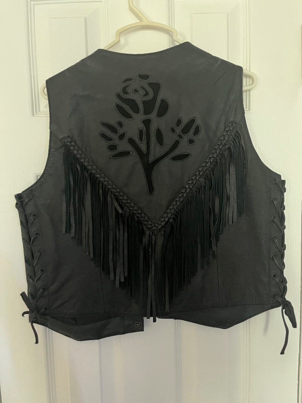 Rose cut out black leather vest